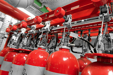 Image showing Large CO2 fire extinguishers in a power plant