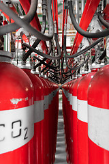 Image showing Large CO2 fire extinguishers in a power plant