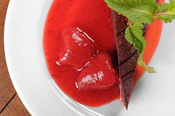 Image showing Chocolate cake with strawberry and chili