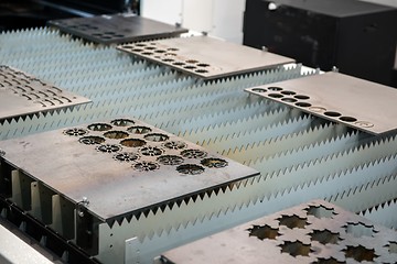 Image showing Laser cutter cutting metal plates