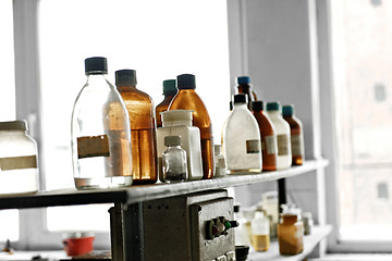 Image showing Old laboratory with a lot of bottles