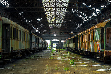 Image showing Cargo trains in old train depot