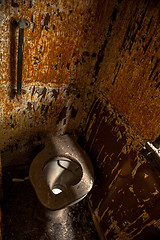 Image showing Used abandoned toilette in grungy room