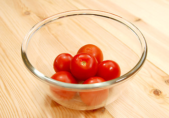 Image showing Fresh red tomatoes in a glass bowl