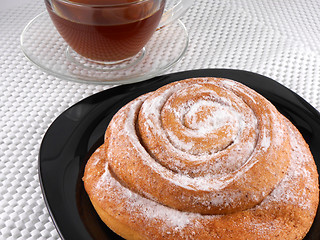 Image showing Toasted cakes and tea cup