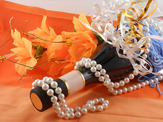 Image showing flowers, white diamonds and a champagne bottle