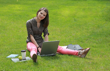 Image showing Woman with a Laptop in Grass