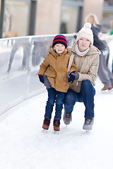 Image showing family skating