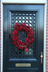 Image showing Christmas wreath on a door