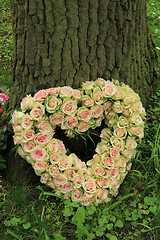 Image showing Heart shaped sympathy flowers