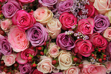 Image showing purple and pink roses wedding arrangement
