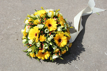 Image showing Yellow sympathy flowers