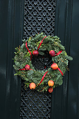 Image showing Christmas wreath on a door