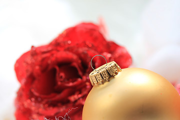 Image showing Christmas decorations in red and gold