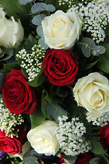 Image showing Red and white roses in a bridal bouquet