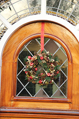 Image showing Stained glass window with a wreath