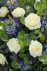 Image showing Blue White Flower arrangement for a wedding