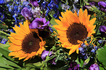 Image showing Sunflowers and purple eustoma