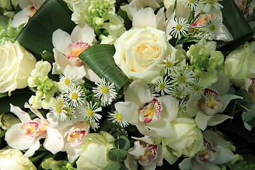 Image showing Orchids and roses in bridal bouquet