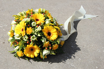 Image showing Yellow sympathy flowers