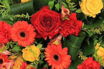 Image showing Red, yellow and orange wedding decorations