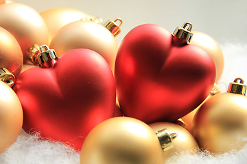 Image showing red heart shaped christmas ornaments