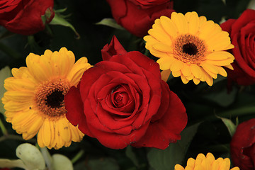 Image showing yellow and red flowers in a bridal arrangement