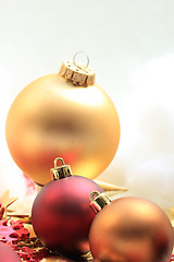 Image showing Christmas decorations in red and gold