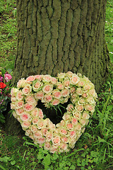 Image showing Heart shaped sympathy flowers