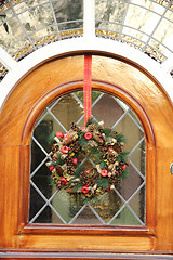 Image showing Stained glass window with a wreath