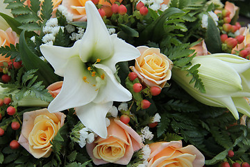 Image showing Roses and lillies in a bridal arrangement