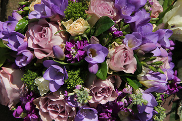 Image showing Bridal bouquet in various shades of purple