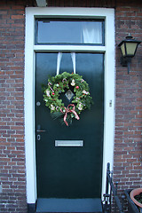 Image showing Christmas wreath on a door