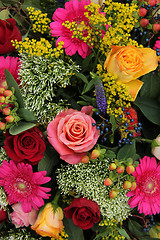 Image showing Mixed flower arrangement in bright colors