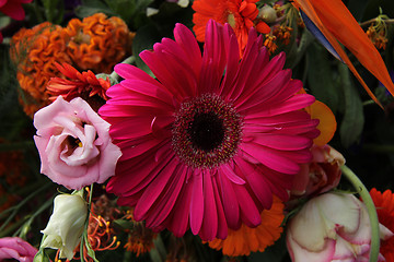 Image showing Floral arrangement in pink, red and orange