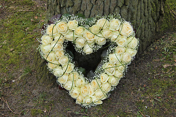 Image showing Heart shaped sympathy flowers