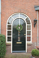 Image showing Christmas wreath on a door