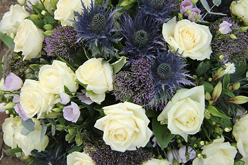 Image showing Blue White Flower arrangement for a wedding