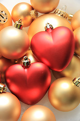 Image showing red heart shaped christmas ornaments