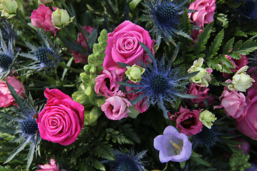 Image showing Floral arrangement in blue, purple and pink