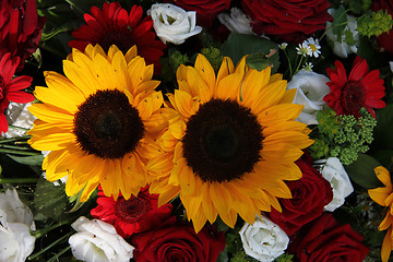 Image showing Sunflowers and roses