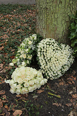 Image showing Heart shaped sympathy flowers