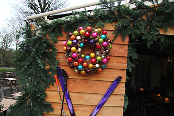 Image showing Log cabin with christmas decorations