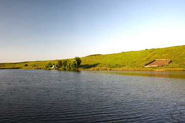 Image showing Lake near green meadow