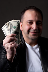 Image showing Man Holding Cash