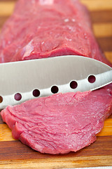 Image showing raw beef cutting