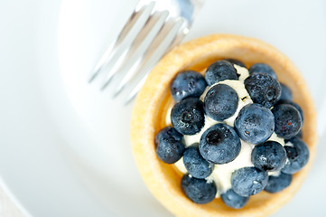 Image showing blueberry cream cupcake