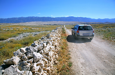 Image showing Field road with car 