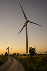 Image showing Windmills at roadside