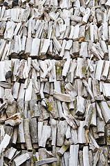 Image showing folded rows of firewood, close-up  